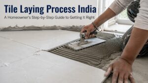 Tile laying process India contractor setting a floor tile with adhesive and spacers